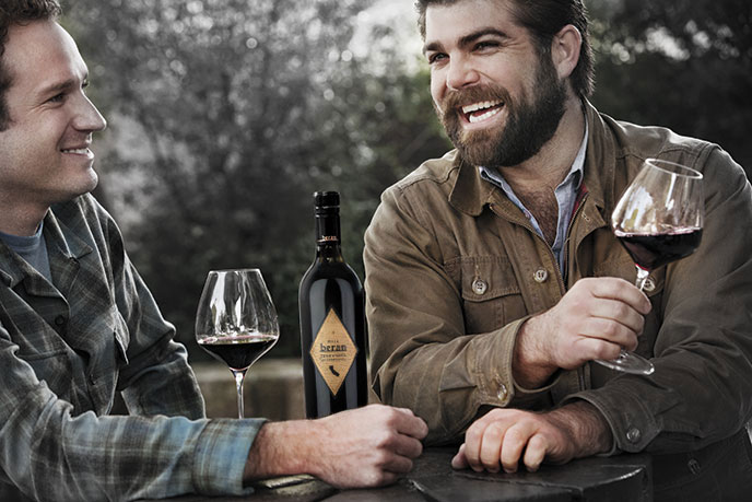 Beran rustic lifestyle image featuring Joe Wagner and friend - bottle of Beran wine and two wine glasses